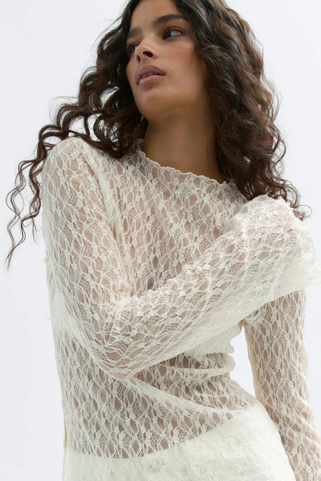 Asymmetric lace top