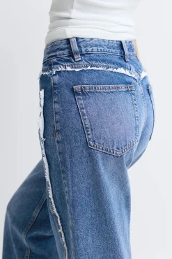 Fringe seam jeans