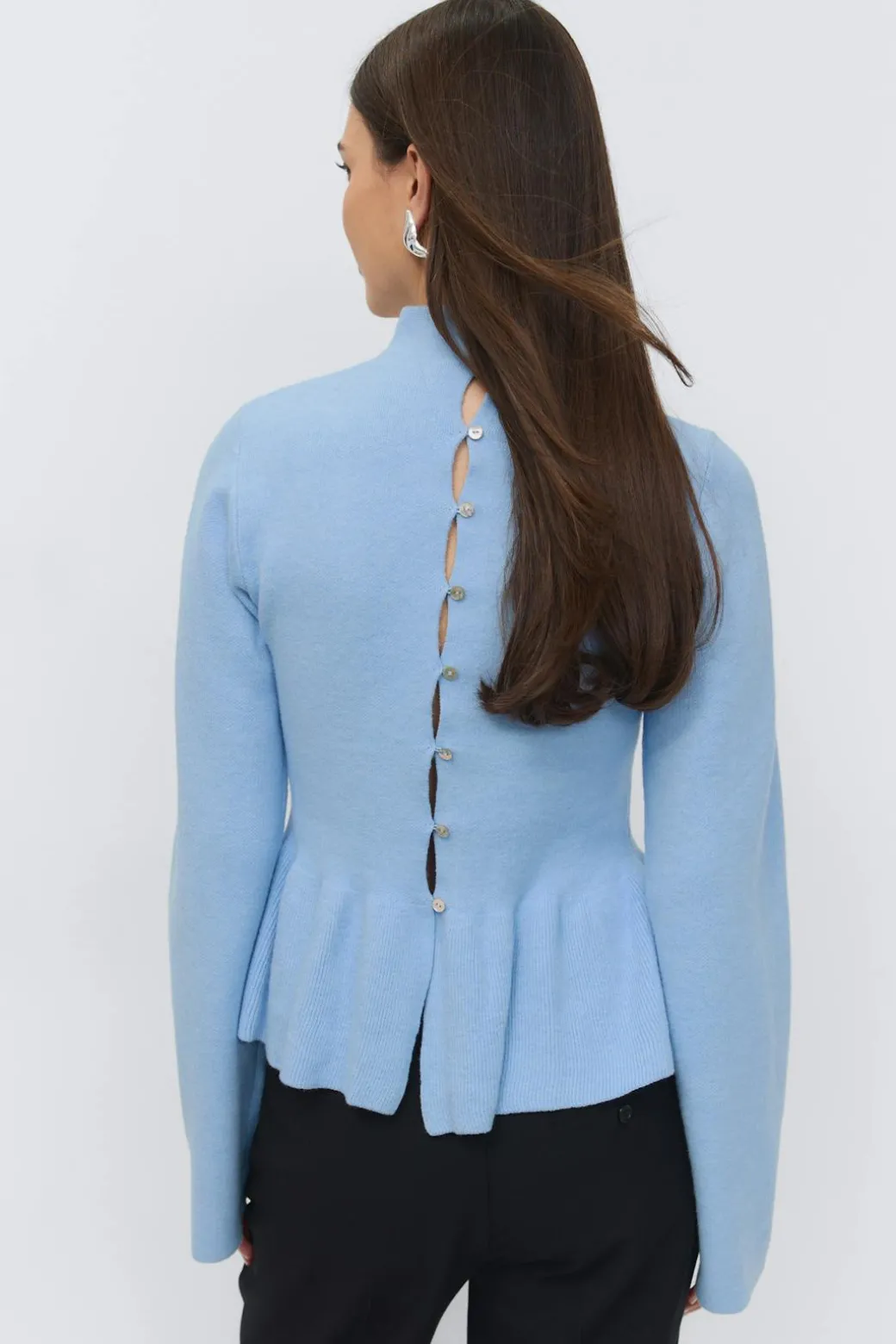 Knitted peplum top