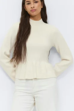Knitted peplum top