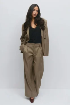 Low wide pleated trousers