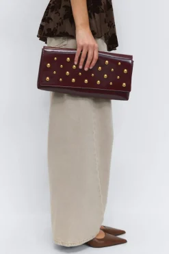 Patent studded clutch