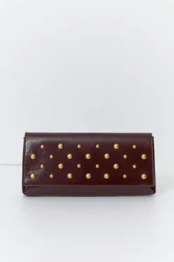 Patent studded clutch