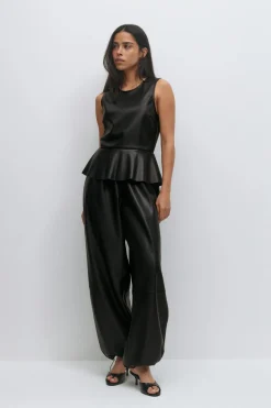 Pu peplum top
