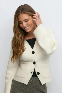 Shaped knitted cardigan
