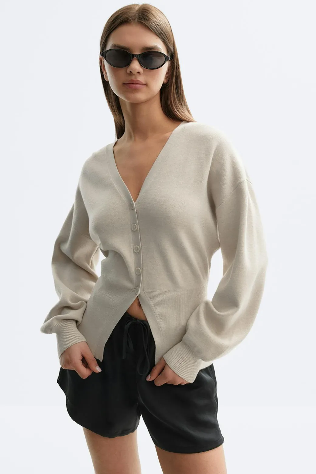Shaped knitted cardigan